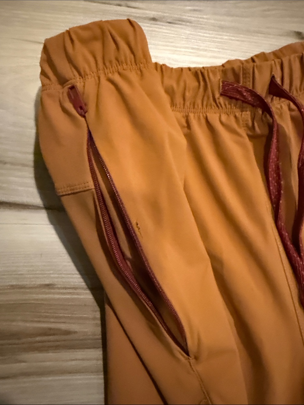 5 inch Fabletics Men's Orange Athletic Shorts with Red Drawstring - Picture 4 of 5
